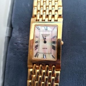 Longines classic unisex watch. 18k gold filled. Mother of pearl  face. Battery.
